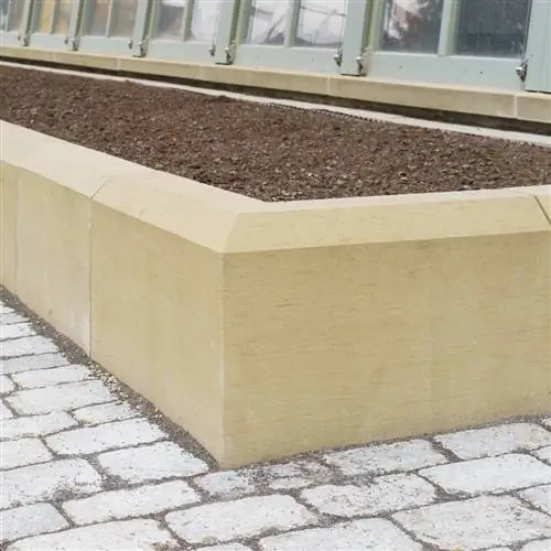 Cama elevada con piedras en L: estructura, ventajas y desventajas