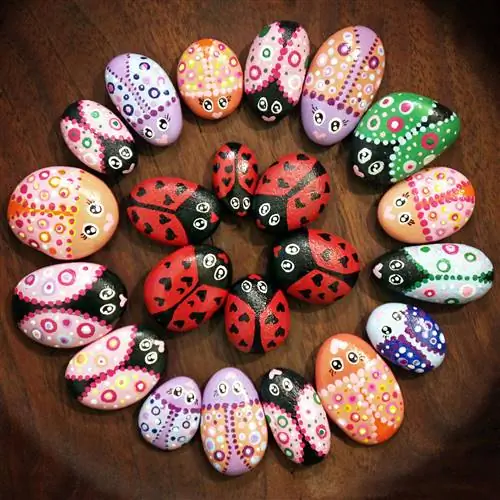 Stones painted as beetles